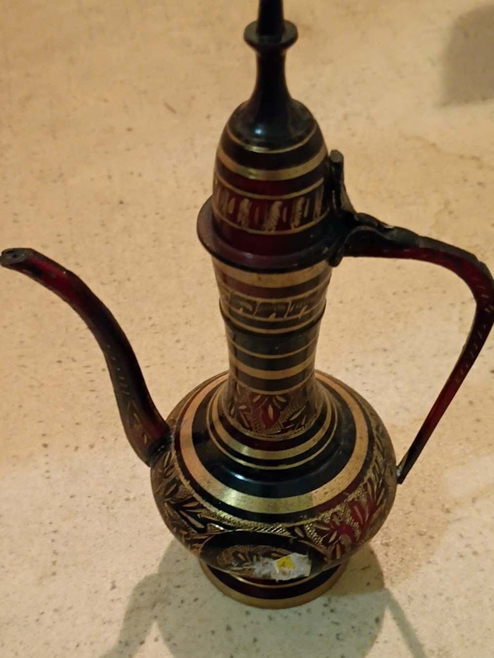 Elegant Red and Black Brass-Style Decorative Ewer with Gold Accents